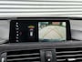 BMW 3-Serie Touring 320d High Executive M Sport Panoramadak Trekhaak HUD LED ACC Individual Shadow Line Camera 19"