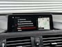 BMW 3-Serie Touring 320d High Executive M Sport Panoramadak Trekhaak HUD LED ACC Individual Shadow Line Camera 19"