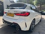 BMW 1-Serie M135i xDrive High Executive BTW 2021 Wit 306pk
