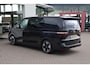 Volkswagen Multivan 1.5 eHybrid L2 Bulli Edition 4Motion 245PK / 180kW DSG, 19" 'Halmstad' LMV, LED Matrix (IQ.Lights), keyless start & entry, elektromechanische stuurbekrachtiging, verwarmbaar stuurwiel, verwarmbare voor- en achterstoelen, verwarmbare en akoestische voorruit, Harman & Kardon geluidssysteem, parkeerpakket plus (achteruitrijcamera (rear view), rondomzichtcamera (area view)), privacy glas (90% getint), dodehoekdetectie (side assist), assistentiepakket plus, dynamic chassis control (dcc), comfortstoelen elektrisch verstelbaar, 2-2-3 premium opstelling, elektrische achterklep (easy open & close), elektrisch verstel-, verwarm- en inklapbare buitenspiegels (spiegelpakket), adaptieve cruise control (acc)