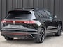 Volkswagen Touareg 3.0 TSi eHybrid 4MOTION R | HEAD-UP | DYNAUDIO | 360 CAMERA | SOFT-CLOSE | PANORAMADAK | KEYLESS ACCESS | STOELMASSAGE | TREKHAAK | AMBIANCE INTERIEUR | SHADOW-LINE | MEMORY SEATS