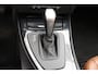 BMW 3-Serie Touring 320i neete station met open dak