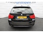 BMW 3-Serie Touring 320i neete station met open dak