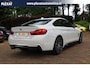 BMW 4-Serie Coupé 430i Centennial High Executive Aut. | M-Performance Pakket | Sportinterieur | Harman-Kardon | Dodehoekbewaking |