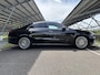 Mercedes-Benz CLA 180 Business Solution AMG | Panoramadak | Burmester | Rijassistentiepakket | Trekhaak | 360 camera | Sfeerverlichting | Stoel/stuurverwarming |