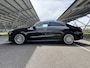 Mercedes-Benz CLA 180 Business Solution AMG | Panoramadak | Burmester | Rijassistentiepakket | Trekhaak | 360 camera | Sfeerverlichting | Stoel/stuurverwarming |