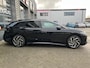 Volkswagen ID.7 Tourer Pro Business | Achterbank in ongelijke delen neerklapbaar incl. middenarmsteun en doorlaadmogelijkheid | Afstandscontrolesysteem (Front Assist), met voetgangers- en fietsersherkenning | Automatische afstandsregeling (Adaptive Cruise Control)