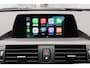 BMW 1-Serie 118i High Executive * Trekhaak * Panoramadak Leder Stoelverwarming