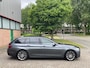 BMW 5-Serie Touring 520D EXE PANO Shadowline Aut