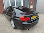 BMW 3-Serie 320i High Executive / Navi / PDC / Clima / LM