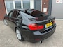BMW 3-Serie 320i High Executive / Navi / PDC / Clima / LM