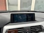 BMW 3-Serie 320i High Executive / Navi / PDC / Clima / LM