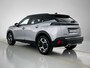 Peugeot 2008 SUV GT 130pk Automaat | Navigatie | Camera v+a | Climate Control | Adaptieve Cruise Control | Leder/Alcantara | Stoel elektrisch+massage+verwarmd | Parkeersensoren v+a | Keyless | Dodehoeksensor | Draadloze Apple Carplay / Android Auto + telefoonlader | Digitaal instrumentenpaneel | DAB+ radio | Full Led koplampen | Donker getint glas | 17" lichtmetalen velgen |