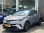 Toyota C-HR 1.8 Hybrid Bi-Tone | Leder | Stoelverwarming | Zomer + winterbanden | Parkeersensoren voor en achter | Toyota Garantie tot 2028!