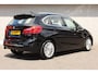BMW 2-Serie Active Tourer (f45) 218i 136pk Aut Corporate Lease High Executive | Camera | Stoelverwarming | Cruise | PDC | Climatronic | NAVI