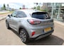 Ford Puma 1.0-125pk EcoBoost Mild-Hybrid Titanium X. Garantie t/m 07-03-2028 ! Slechts 7.400km ! Cruise cntrl, climate cntrl, stoel-, stuur- en voorraamverw., draadloos opladen telefoon, trekhaak afneembaar, navigatie, telefoonvoorb., LM wielen, B&O soundsyst., digitaal dashboard etc.