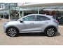 Ford Puma 1.0-125pk EcoBoost Mild-Hybrid Titanium X. Garantie t/m 07-03-2028 ! Slechts 7.400km ! Cruise cntrl, climate cntrl, stoel-, stuur- en voorraamverw., draadloos opladen telefoon, trekhaak afneembaar, navigatie, telefoonvoorb., LM wielen, B&O soundsyst., digitaal dashboard etc.