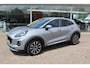 Ford Puma 1.0-125pk EcoBoost Mild-Hybrid Titanium X. Garantie t/m 07-03-2028 ! Slechts 7.400km ! Cruise cntrl, climate cntrl, stoel-, stuur- en voorraamverw., draadloos opladen telefoon, trekhaak afneembaar, navigatie, telefoonvoorb., LM wielen, B&O soundsyst., digitaal dashboard etc.