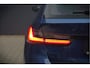 BMW 3-Serie Touring 330e High Executive Sportline | Keyless | PDC | Leer | Hifi | Ambiance Verlichting | Stoelverwarming | Adaptive Cruise Control | BTW | LED | Shadow Line | Navigatie Prof. | DAB |