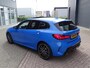 BMW 1-Serie M135i xDrive High Executive PANORAMADAK|HEAD-UP DISPLAY|DODEHOEK DETECTIE|ACHTERUIT RIJ CAMERA|SPORT STOELEN|KEYLESS ENTRY/GO|NAVIGATIE|LASER KOPLAMPEN