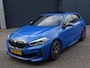 BMW 1-Serie M135i xDrive High Executive PANORAMADAK|HEAD-UP DISPLAY|DODEHOEK DETECTIE|ACHTERUIT RIJ CAMERA|SPORT STOELEN|KEYLESS ENTRY/GO|NAVIGATIE|LASER KOPLAMPEN
