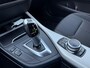 BMW 1-Serie 118i Corporate Lease Executive NAVI | PDC | AIRCO | CRUISE | NWE APK