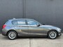 BMW 1-Serie 118i Corporate Lease Executive NAVI | PDC | AIRCO | CRUISE | NWE APK