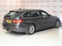 BMW 3-Serie Touring 320i High Executive NL auto, Leder, Trekhaak