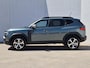 Dacia Duster 1.6 Hybrid 140 Journey Automaat / Pack winter / Navigatie via Apple Carplay of Android Auto / Stuur- en Stoelverwarming / Cruise control / Achteruitrijcamera / Draadloze telefoon lader / Climate control /