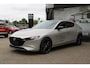 Mazda 3 2.0 e-SkyActiv-X M Hybrid 186 Nagisa Demovoordeel € 5.000,-, Bruin Leder, Bose, Navi, Adap.Cruise, Clima, Apple Carplay, Camera, PDC, HUD, Stoelverwarming, 18" LMV