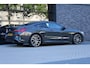 BMW 8-Serie M850i xDrive High Executive | NAP | BTW | B&W | 4WIELSTURING | CARBON | SOFT-CLOSE | HUD | 360 | KEYLESS |