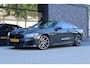 BMW 8-Serie M850i xDrive High Executive | NAP | BTW | B&W | 4WIELSTURING | CARBON | SOFT-CLOSE | HUD | 360 | KEYLESS |