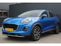 Ford Puma 1.0 EcoBoost Titanium | Incl. 12 maanden garantie | Trekhaak | Dodehoek detectie | Cruise control | Apple Carplay/Android auto | Lichtmetalen velgen | Elektrische kofferklep | DAB | Airco | Climate control | Navigatie
