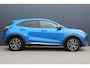 Ford Puma 1.0 EcoBoost Titanium | Incl. 12 maanden garantie | Trekhaak | Dodehoek detectie | Cruise control | Apple Carplay/Android auto | Lichtmetalen velgen | Elektrische kofferklep | DAB | Airco | Climate control | Navigatie
