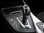 BMW 1-Serie M140i 340 PK M-SPORT AUT8 + HARMAN/KARDON | 19 INCH | SPORTUITLAAT | CAMERA | STOELVERWARMING