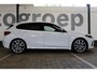 BMW 1-Serie M135i xDrive High Executive | Akrapovič uitlaatsysteem | Cruise control | Climate control | Stoelverwarming | Apple carplay/Android auto | DAB radio | Dealer onderhouden |
