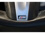 BMW 1-Serie M135i xDrive High Executive | Akrapovič uitlaatsysteem | Cruise control | Climate control | Stoelverwarming | Apple carplay/Android auto | DAB radio | Dealer onderhouden |