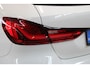 BMW 1-Serie M135i xDrive High Executive | Akrapovič uitlaatsysteem | Cruise control | Climate control | Stoelverwarming | Apple carplay/Android auto | DAB radio | Dealer onderhouden |