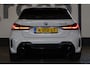 BMW 1-Serie M135i xDrive High Executive | Akrapovič uitlaatsysteem | Cruise control | Climate control | Stoelverwarming | Apple carplay/Android auto | DAB radio | Dealer onderhouden |