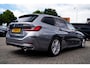 BMW 3-Serie Touring 320e | Panorama | Elektrische trekhaak | Luxe Leder/stof | Achteruitrijcamera | Shadowline | Stoelverwarming |