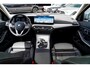BMW 3-Serie Touring 320e | Panorama | Elektrische trekhaak | Luxe Leder/stof | Achteruitrijcamera | Shadowline | Stoelverwarming |