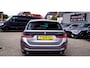 BMW 3-Serie Touring 320e | Panorama | Elektrische trekhaak | Luxe Leder/stof | Achteruitrijcamera | Shadowline | Stoelverwarming |