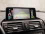 BMW 1-Serie 116i Sportline Automaat (APPLE CARPLAY, CAMERA, 4 CILINDER, XENON, SPORTSTOELEN, PARKEERSENSOREN, CRUISE, NIEUWE APK, NIEUWSTAAT)