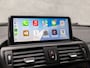 BMW 1-Serie 116i Sportline Automaat (APPLE CARPLAY, CAMERA, 4 CILINDER, XENON, SPORTSTOELEN, PARKEERSENSOREN, CRUISE, NIEUWE APK, NIEUWSTAAT)