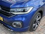 Volkswagen T-Cross 1.5 TSI R-Line / AUTOMAAT/ 150 PK/ 2X R-LINE/ ADAPT. CRUISE/ KEYLESS/ PARK. SENSOREN + CAMERA/ APP-CONNECT/ RIJ-MODI/ CLIMA/ NAVI/ 18" LMV/ DAB/ STOEL VERWARM./ DIGITAL DASH