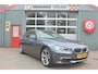 BMW 3-Serie Touring 320i High Executive trekhaak leder 12 mnd. gar.