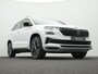 Skoda Karoq 1.5 TSI 150 pk DSG Sportline Business | Trekhaak | CANTON sound | Rondomzicht camera | Stoel-/achterbankverwarming | Side Assist