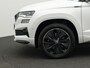 Skoda Karoq 1.5 TSI 150 pk DSG Sportline Business | Trekhaak | CANTON sound | Rondomzicht camera | Stoel-/achterbankverwarming | Side Assist