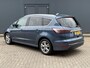 Ford S-Max 2.5i HEV Luxury 5P Automaat / Trekgewicht 1.750 kg / Apple Carplay Android Auto / Allseason banden / Stoelverwarming / Achteruitrijcamera / Elektrische achterklep / Navigatie / Adaptief CC / Climate control / Keyless Entry/Start /