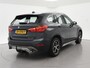 BMW X1 sDrive20i 192 PK AUT. + TREKHAAK | PANORAMA | SPORTSTOELEN LEDER | HEAD-UP | CAMERA | STOELVERWARMING